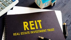 Making Smart Investments in Real Estate Stocks: A Podcast Guide on REITs Facing Challenges